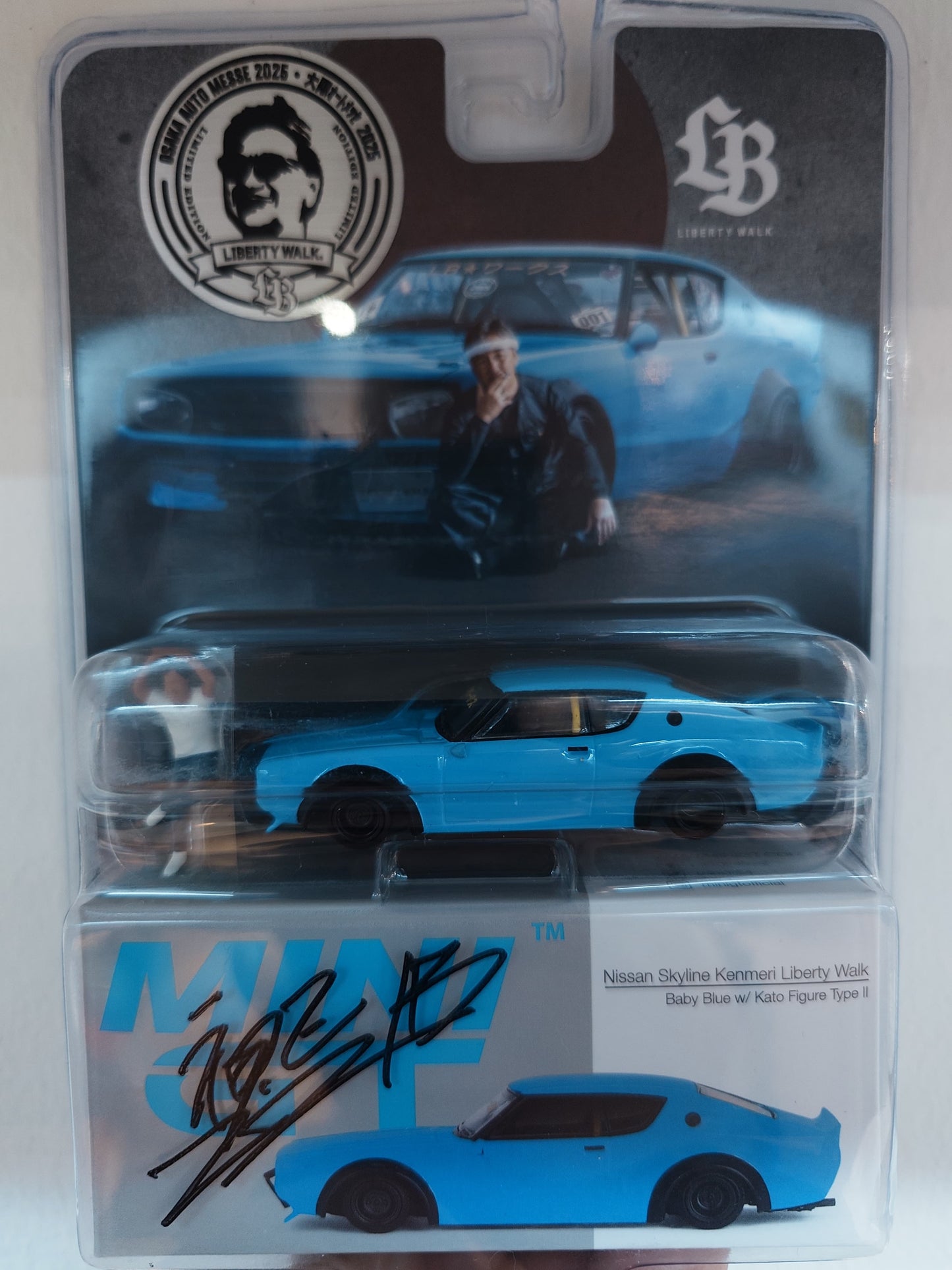 1/64 MiniGT Nissan Skyline Kenmeri Liberty Walk Baby Blue w/ Kato Figure Type II (MGT00711) (Osaka Auto Messe 2025 Exclusive) (Signed)